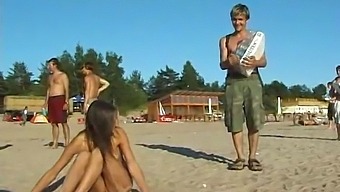 A Stunning Young Girl Enjoys Nude Beach Activities